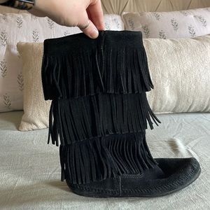 Black fringed Minnetonka boots